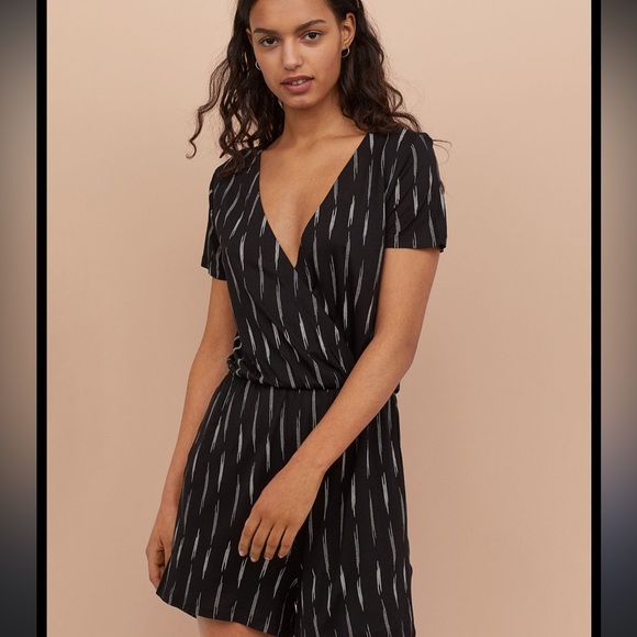H&M Pants - H&M Women Black Printed Jersey playsuit Romper‎ summer vacation large